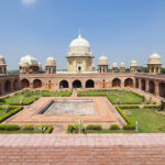 Explore Mughal architecture and visit a Sufi saint's tomb
